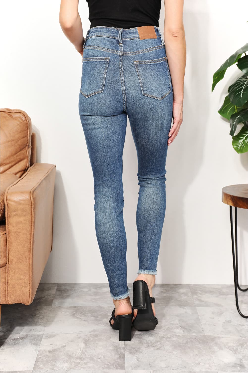 Back View. Judy Blue, High Waist Tummy Control Side Slit & Fray Hem Skinny Style 88682