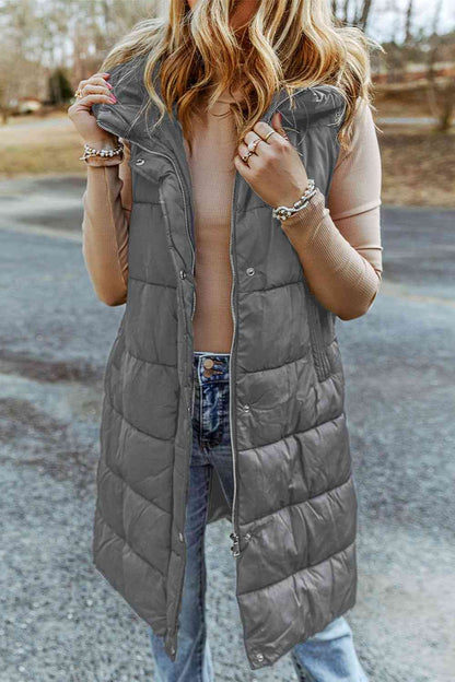 Longline Hooded Sleeveless Puffer Vest In Charcoal